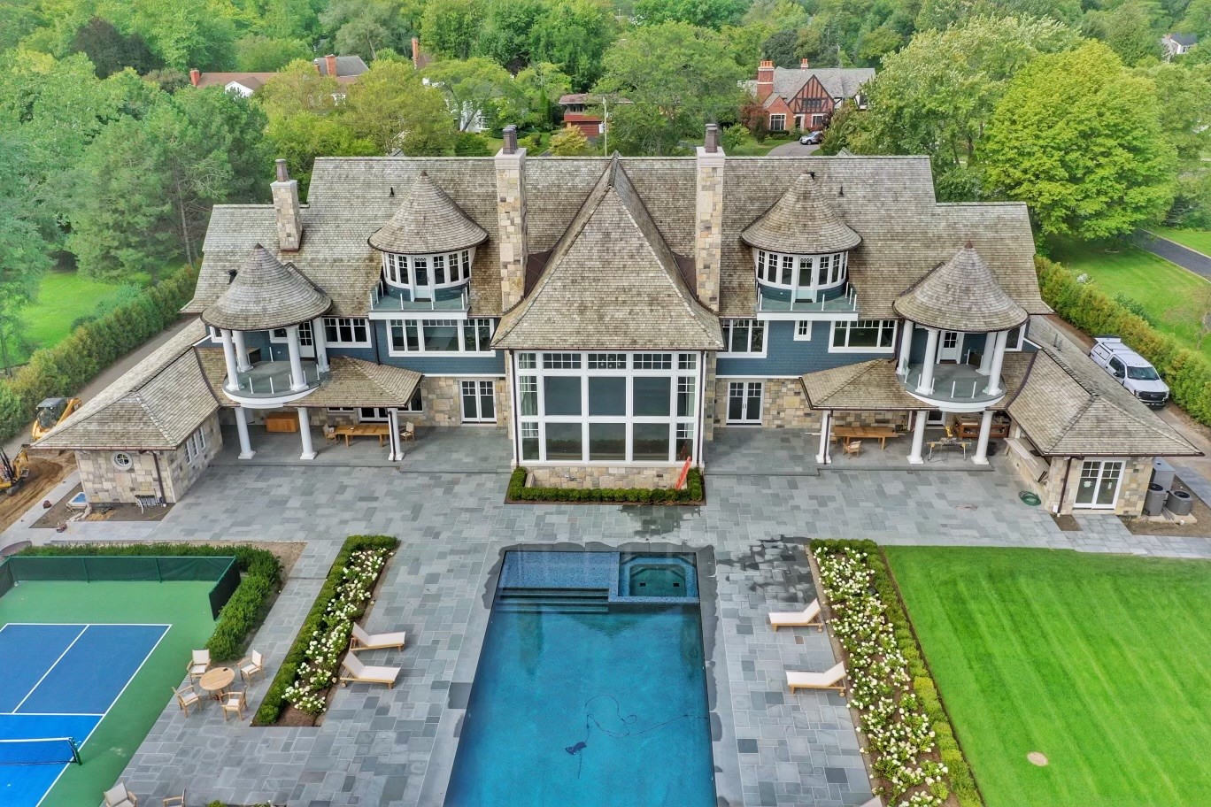 mansion with court and pool